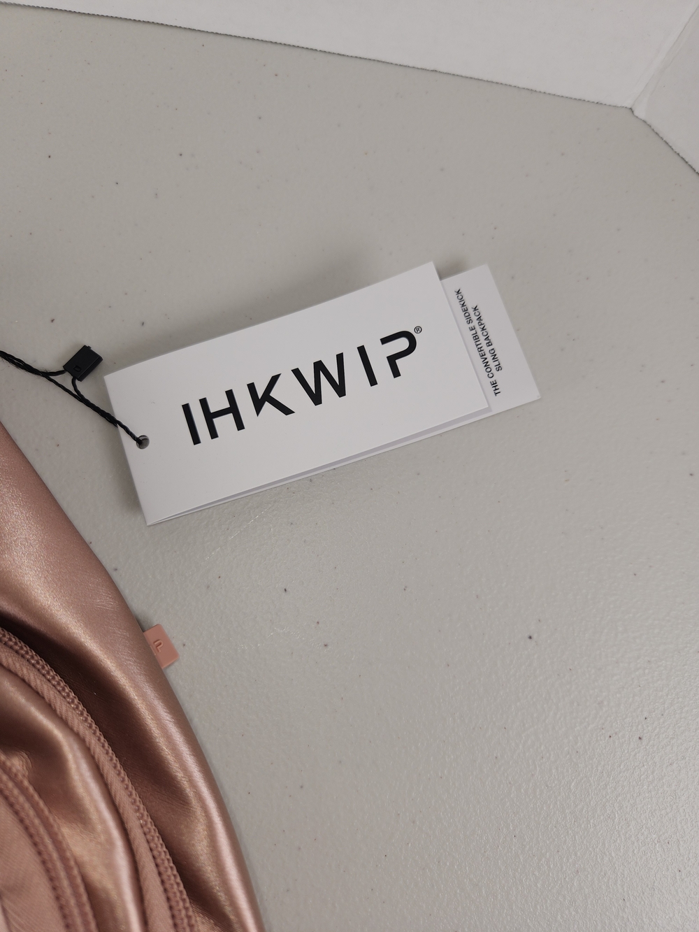 Ihkwip NWT THE CONVERTIBLE SIDEKICK SLING BACKPACK - Rose Gold WOVEN - Picture 4 of 16